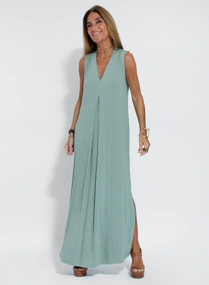 A must-have women's two-piece dress and tailored vest set. This slimming ensemble is a wardrobe essential.