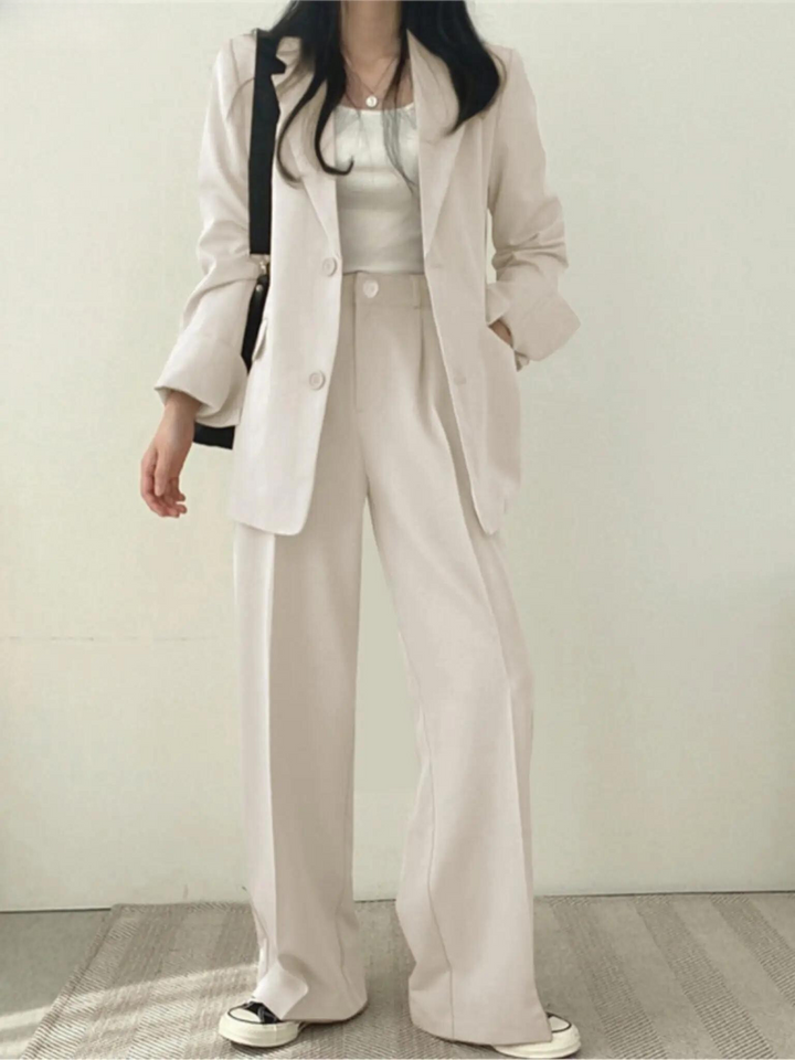 Versatile women's two-piece suit set. Professional, elegant, and comfortable for office to events.