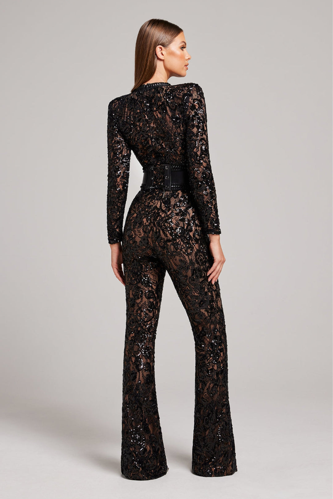 Flattering women's evening jumpsuit with V-neck. Feel elegant & confident at parties & formal events.