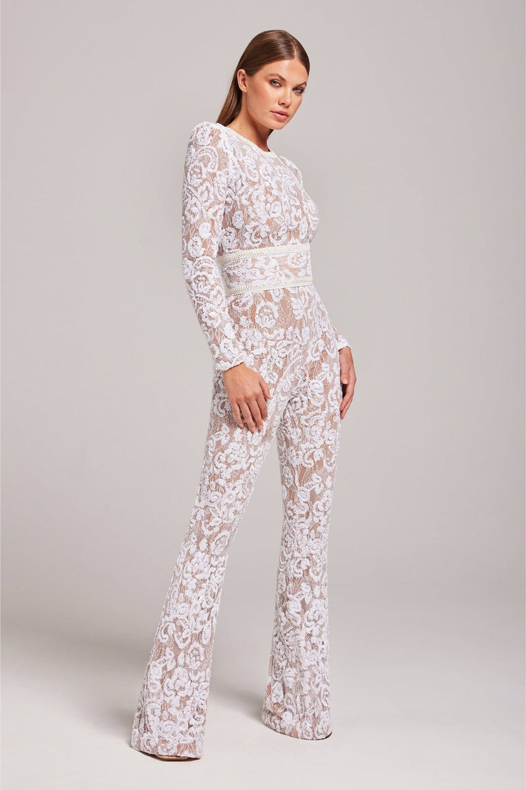 Fashionable V-neck jumpsuit for women, offering an elegant and chic look for evening and party wear.