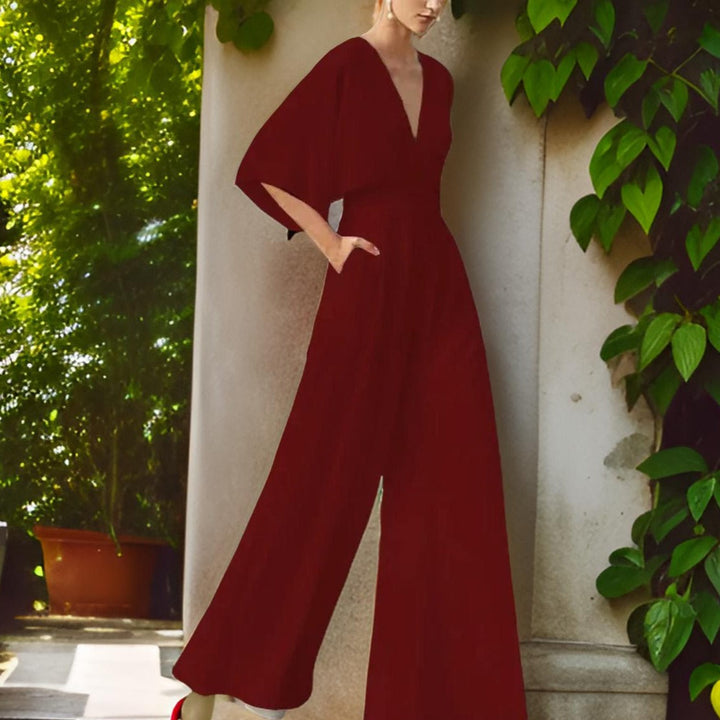 Comfortable women's V-neck jumpsuit, three-quarter sleeves. Versatile for casual summer or dressy occasions.