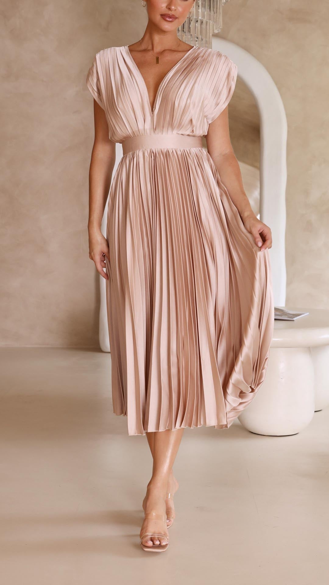 Light & airy women's V-neck summer dress with an elegant adjustable tie back for warm days.