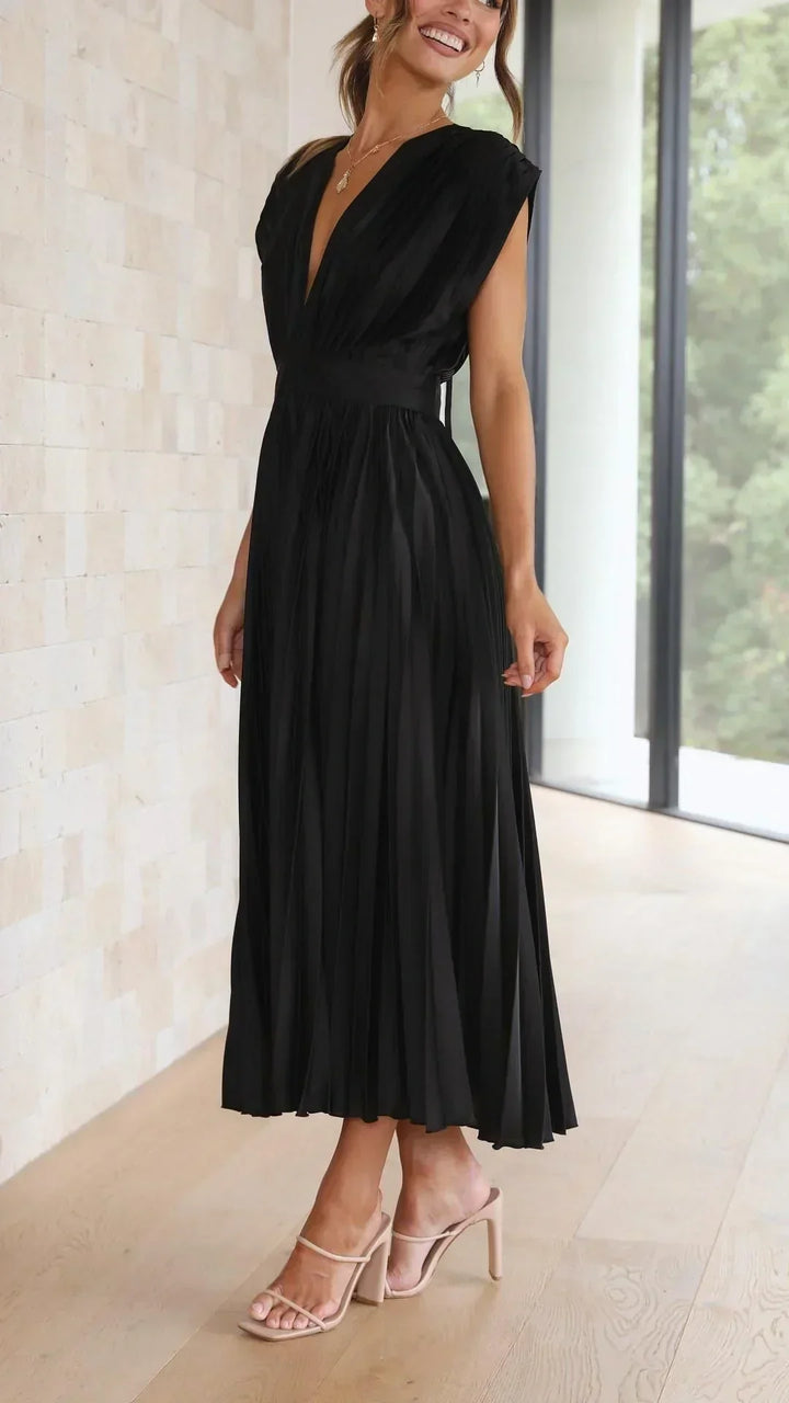 Adjustable fit women's V-neck midi dress, offering comfort & style with a fashionable tie back.