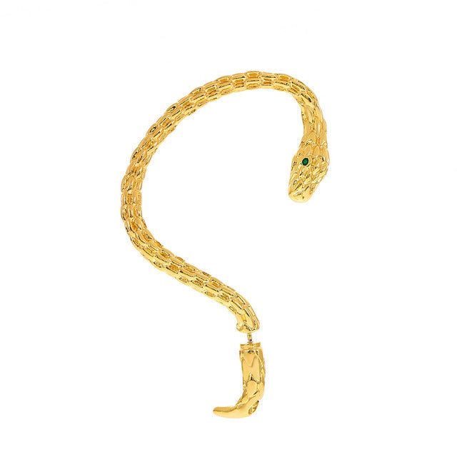 Close-up of delicate vintage clip-on earrings. Gold tone, comfortable fit for non-pierced ears, elegant design.