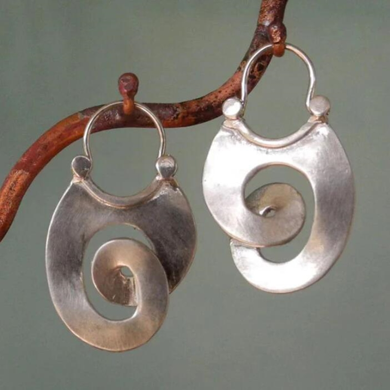 Elegant Women's Vintage Silver Spiral Earrings. Stylish statement jewelry, a perfect fashion accessory for her.