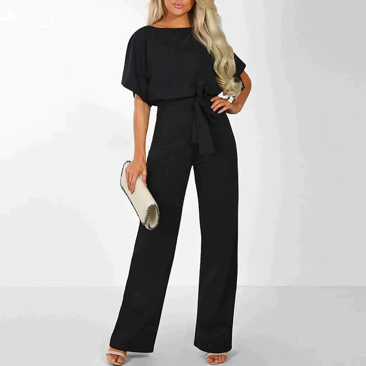 Elegant women's wide-leg summer jumpsuit in a chic solid color, perfect for sophisticated comfort and versatile styling.