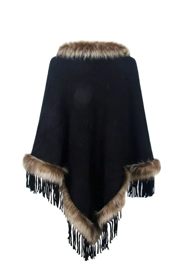 Chic women's winter poncho, elegant and warm. Versatile outerwear for a fashionable, cozy look.