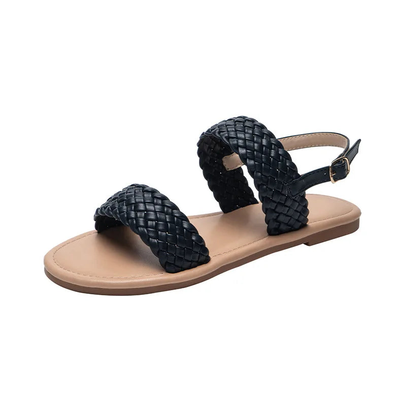 Pair of Elina casual flat sandals for women, featuring a non-slip sole ideal for summer activities.
