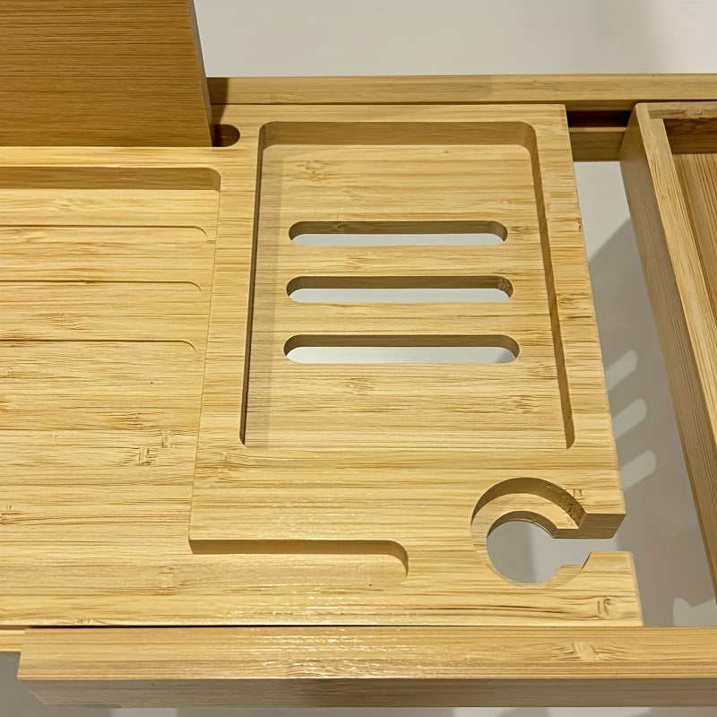 Close-up of a bamboo bathtub caddy showcasing multiple compartments and extendable design for ultimate bath relaxation