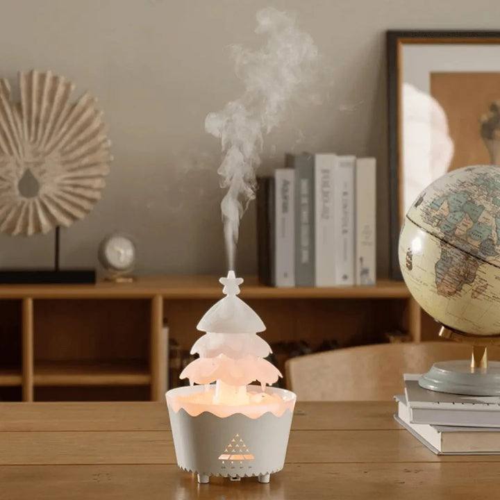 Elegant Christmas tree essential oil diffuser, ideal for silent aromatherapy and creating a festive holiday atmosphere.