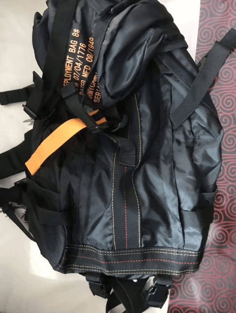 Detail of MOLLE webbing system on FieldGear water-resistant tactical backpack for attaching accessories