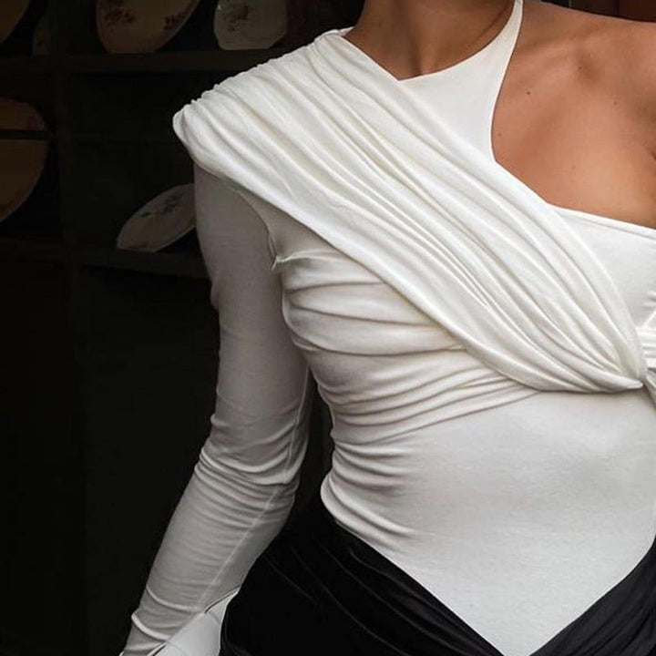Versatile women's long-sleeve bodysuit with sophisticated drape. Perfect for chic evening wear or stylish daywear.