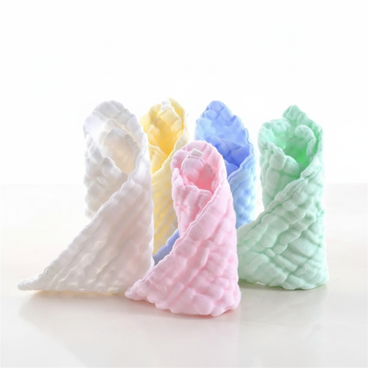 Set of five small, vibrantly colored cotton cleaning cloths for kids, great for kitchen and playtime cleanup.