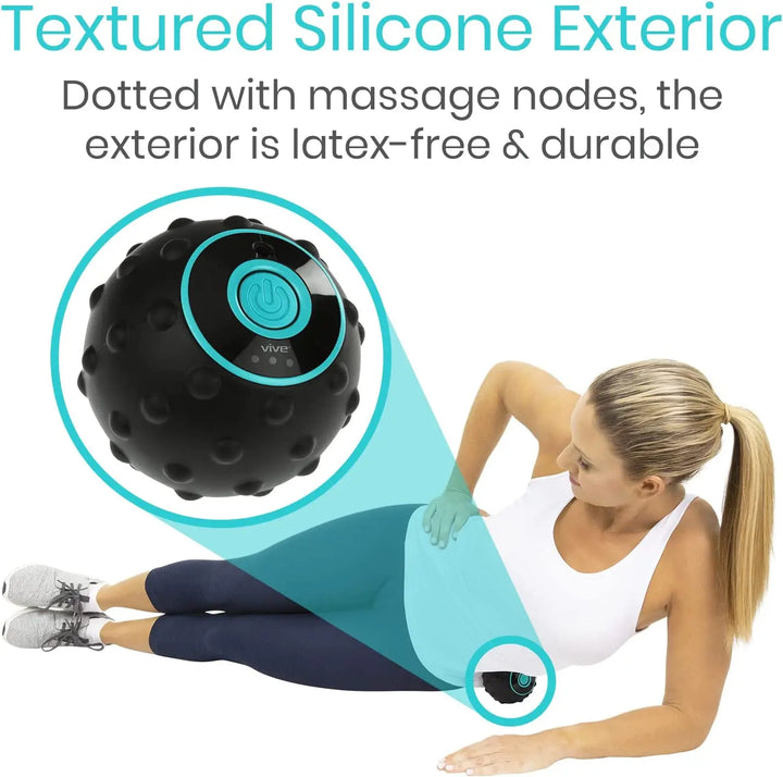 Deep tissue vibrating massage ball with heat and textured surface for fitness recovery.