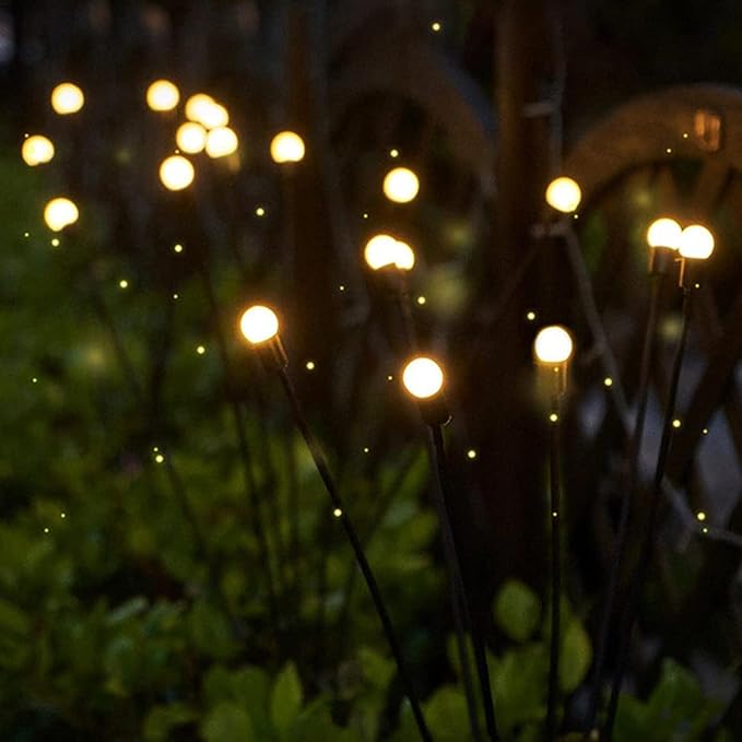 Vibrant solar firefly garden lights with a swaying motion, perfect for whimsical yard & outdoor landscape decor.