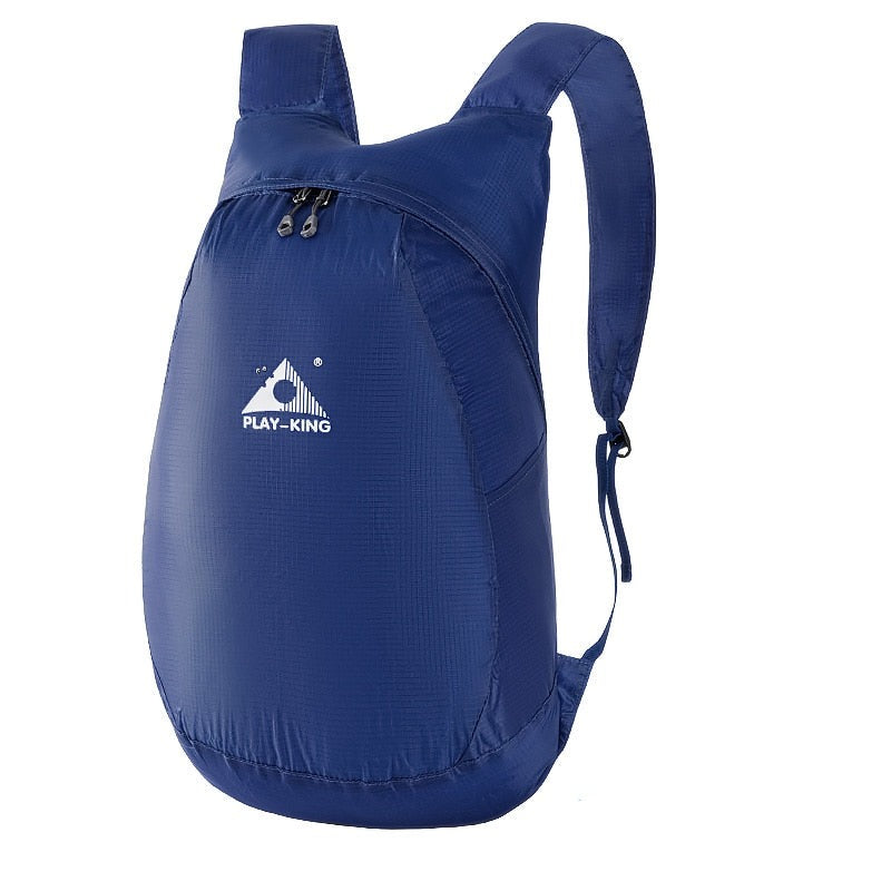 Unisex lightweight 20L daypack, folded for easy storage, ideal for travel and hiking.