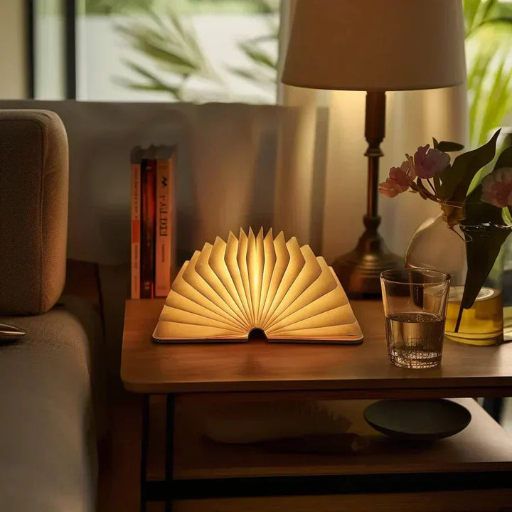 StoryGlow folding LED book lamp, designed like a book, offers warm, soft light. Great home decor.