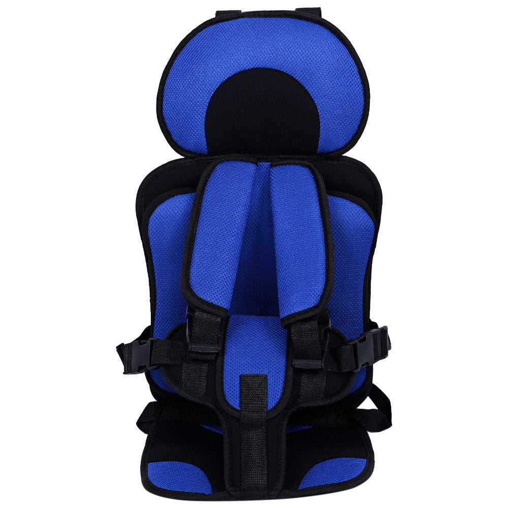 Robust kids' car seat with side wings for enhanced impact protection, in a car interior setting.