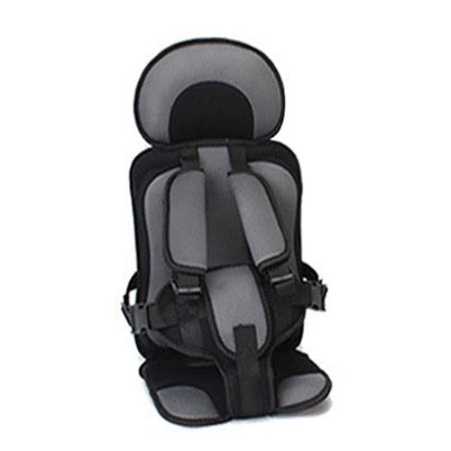 Comfortable fabric car seat for children, highlighting soft padding and easy-to-clean materials.