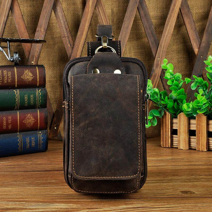Classic genuine leather men's waist pack with multiple pockets for hands-free organization.