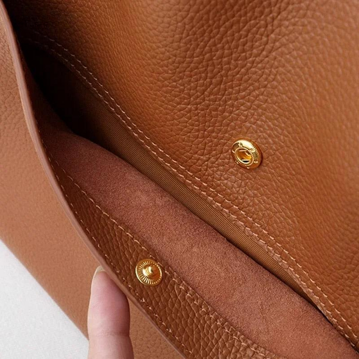 Premium genuine leather women's handbag, durable and classic in style.