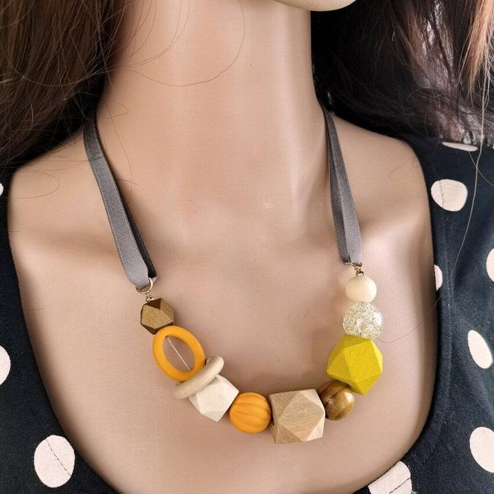 Artistic geometric wood and pearl necklace. Vibrant, modern design. A unique statement piece for her.