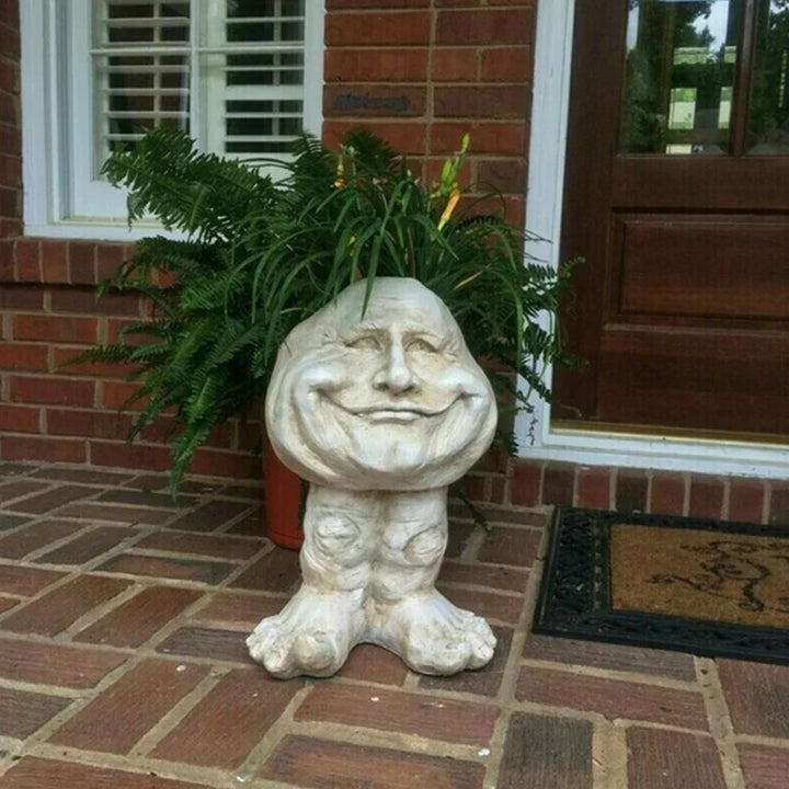 Cute GigglePot Funny Face Resin Planter, ideal succulent plant holder for whimsical home & office decor.