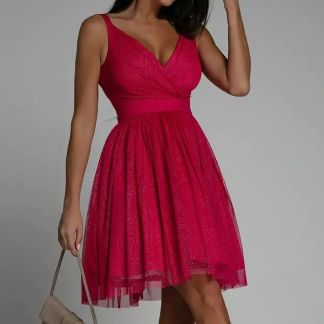Seraphina sleeveless sequin evening dress, shimmering for a glamorous party, featuring a deep v-neck design.