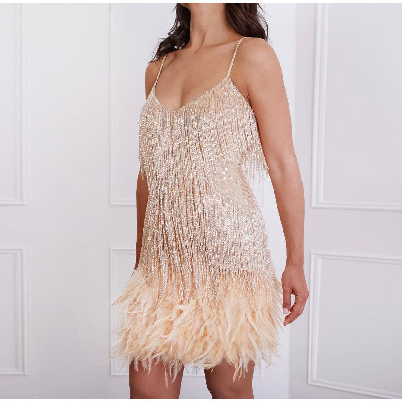 Stunning women's sequin cocktail dress, sleeveless, with unique feather accents. Perfect for glamorous parties.