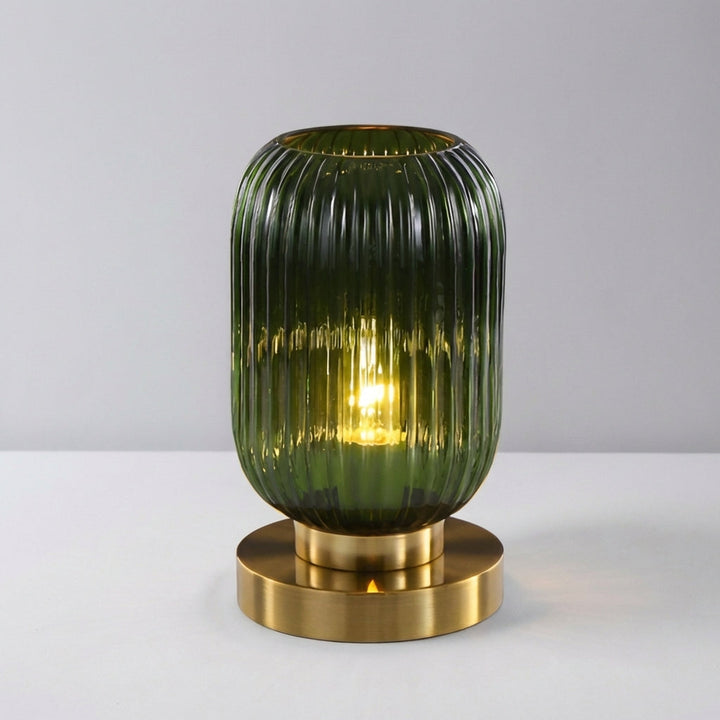 Decorative unisex ribbed glass table lamp, enhancing home decor with LED lighting