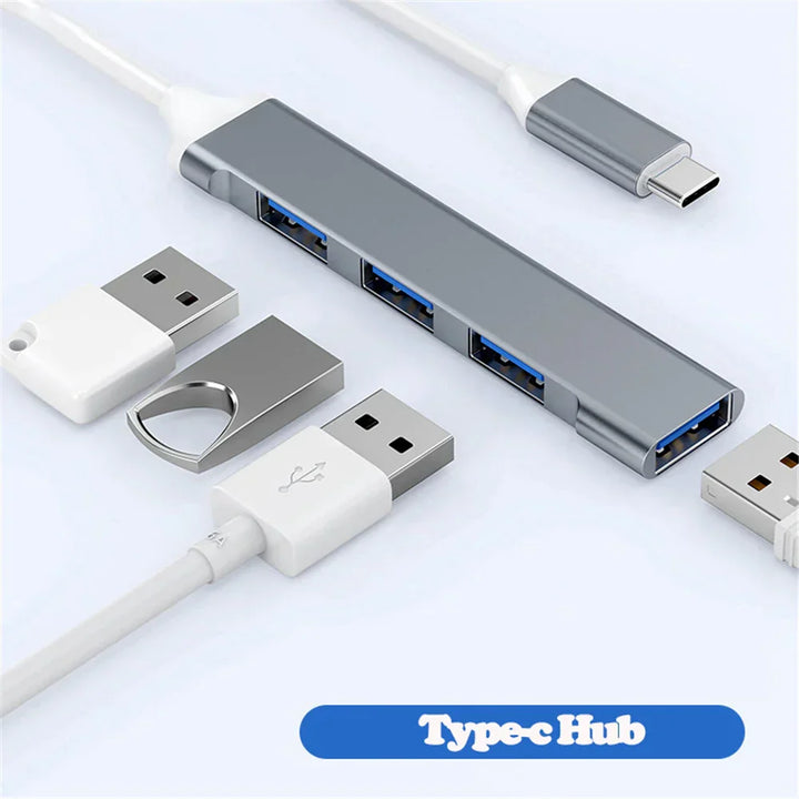Veyno 4-port USB hub in gray, showing multiple USB-A and one USB-C input