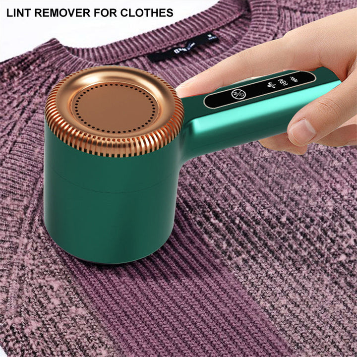 Unisex portable green USB rechargeable lint remover for sweaters, coats & upholstery.