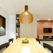 Artisan natural wood pendant light, unique handcrafted ceiling fixture for modern interior design.
