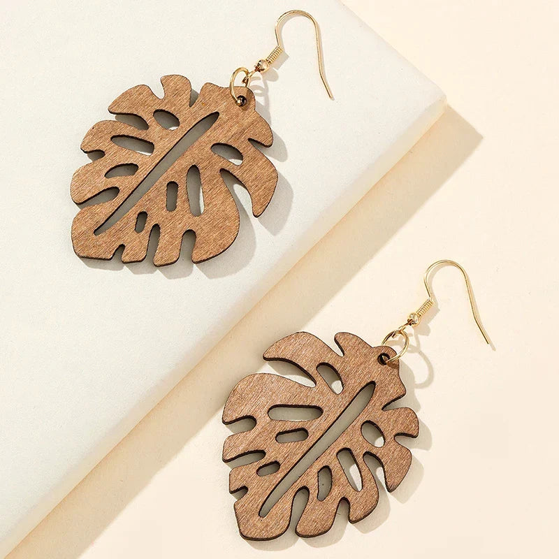 Unique boho chic carved wooden earrings, perfect handmade dangle gift for women with retro style.