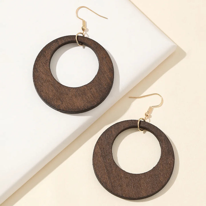 Artisan handmade carved wooden earrings, featuring retro charm and a unique dangle style for women.