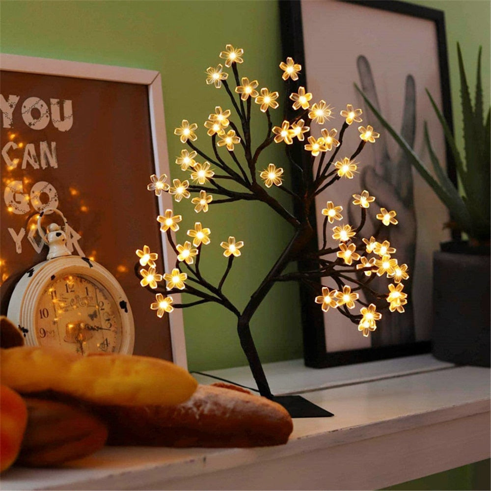 LumiBlossom LED cherry blossom tree with flexible branches, providing warm lighting for any space.