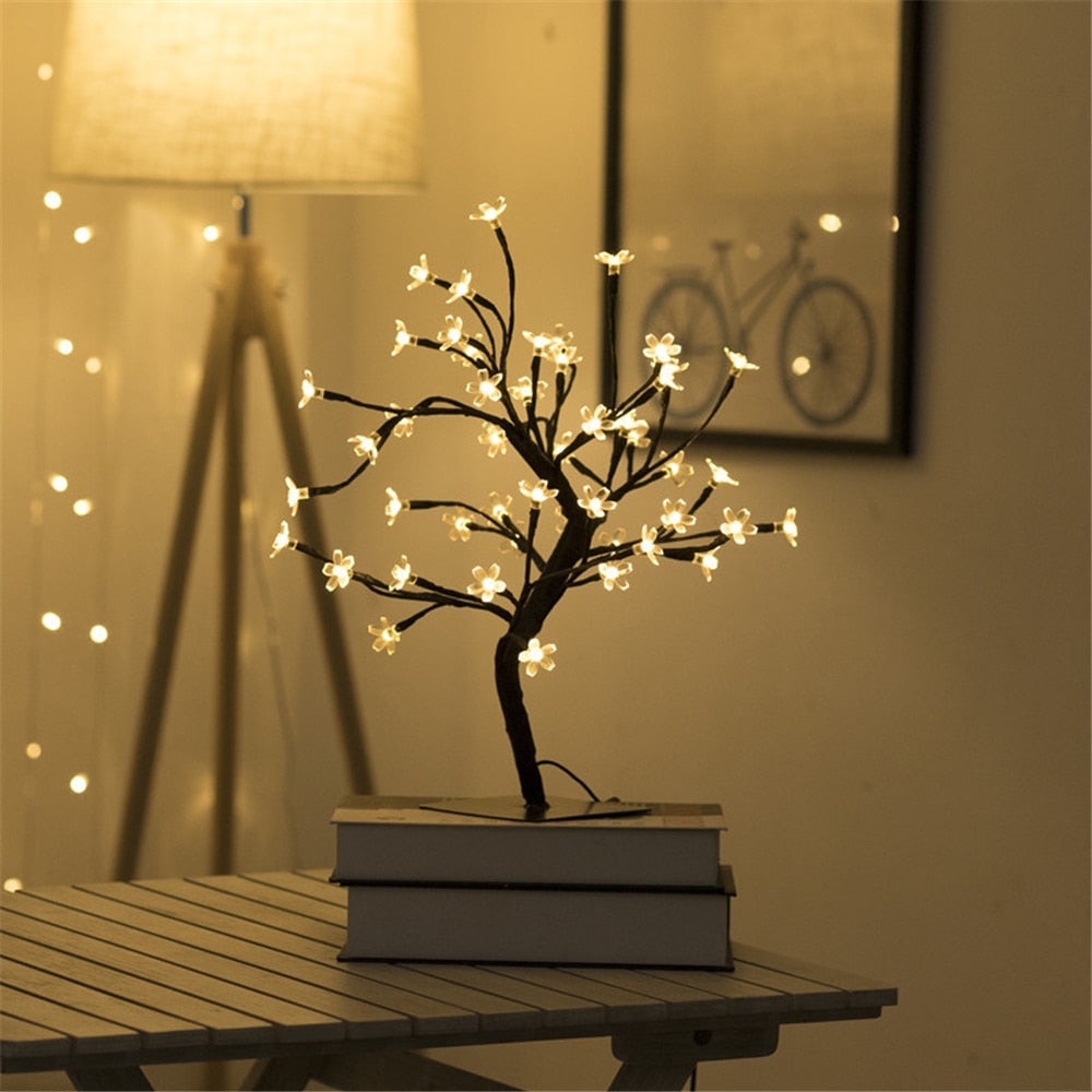 Elegant cherry blossom tree lamp for home decor, featuring soft LED lighting and flexible branches.