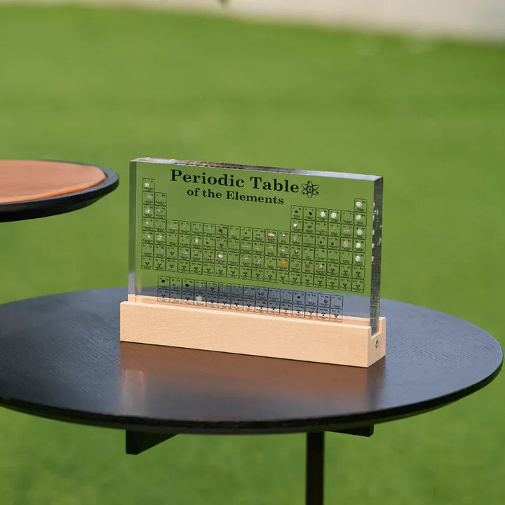 Close-up of Elementa Illuminated Periodic Table, showcasing real element samples, chemistry decor