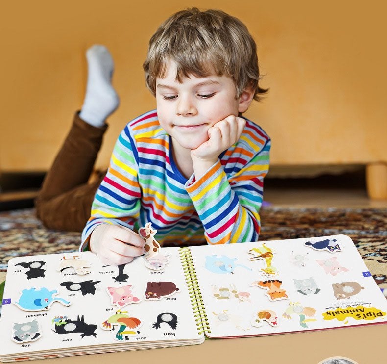 Educational busy book with various activities like zipping, buttoning, and lacing for skill development.