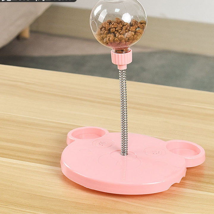 Engaging TreatTumble pet puzzle toy, dispenses treats & wobbles for mental enrichment & playtime.