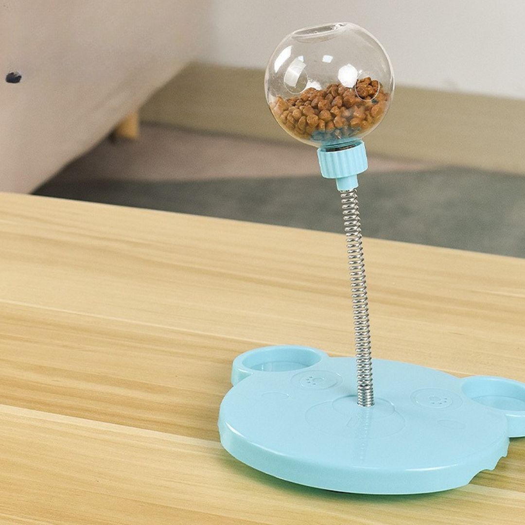 Durable TreatTumble wobble toy for pet training & reward. Dispenses snacks, stimulating play for dogs & cats.