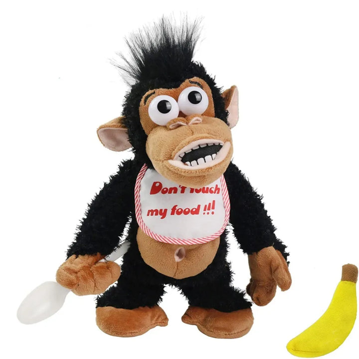 Interactive plush monkey toy for kids, holding a banana. Perfect children's playtime companion.