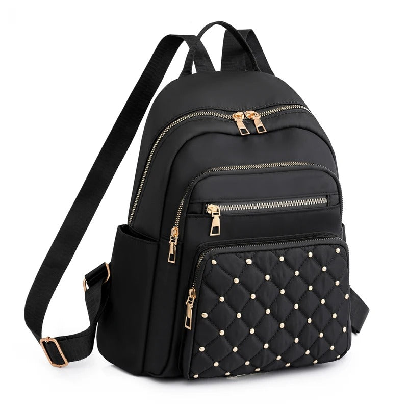 Khaki women's lightweight water-resistant nylon backpack, perfect for daily use, school, or travel.
