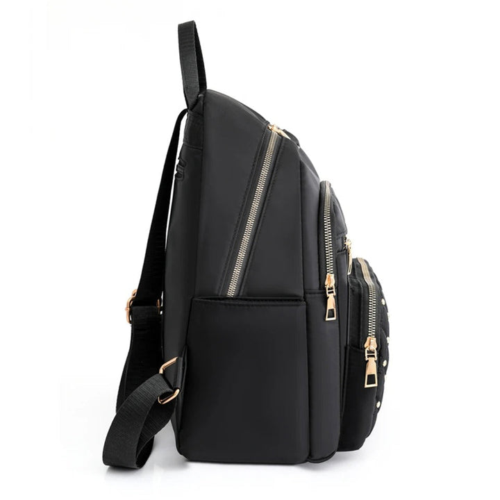 Front view of a khaki women's nylon backpack with multiple pockets, suitable for school or daily use.