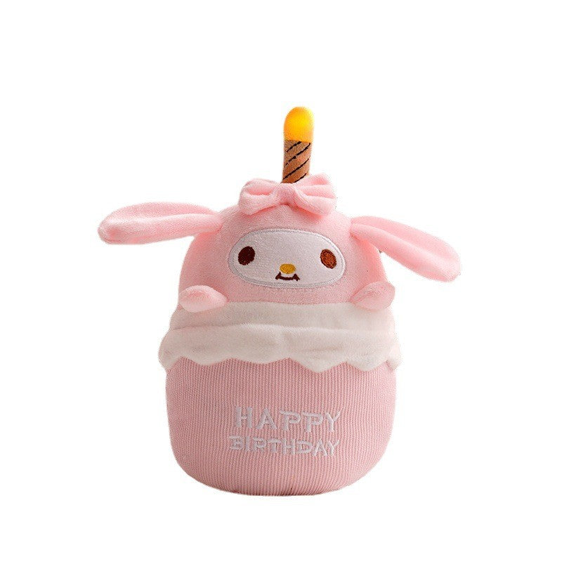 Vibrant musical plush birthday cake for kids, features interactive lights & sound. Perfect party decor.