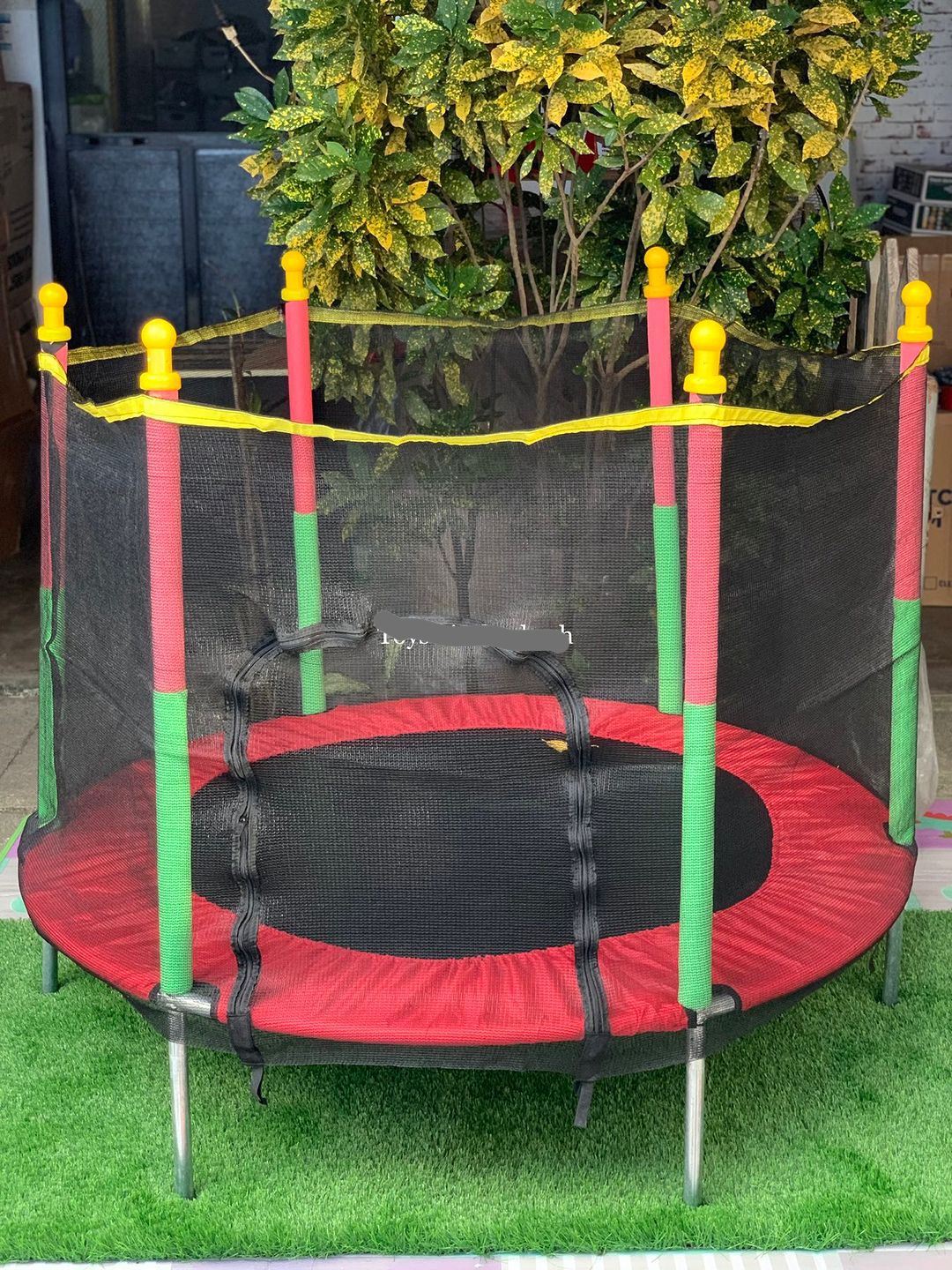 Toddler & children's active play trampoline with safety net enclosure, promoting healthy outdoor activity.