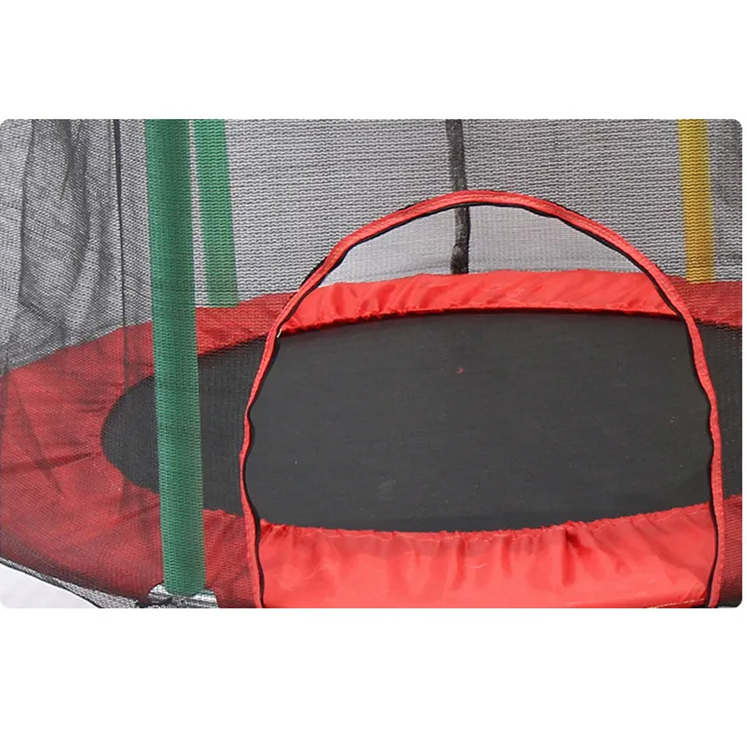 Happy kids jumping on an outdoor trampoline with a safety net, enjoying active backyard playtime.