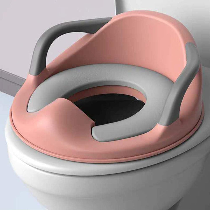 Children's potty training seat with handles, anti-slip feature & comfortable design; aids toddler toilet transition.