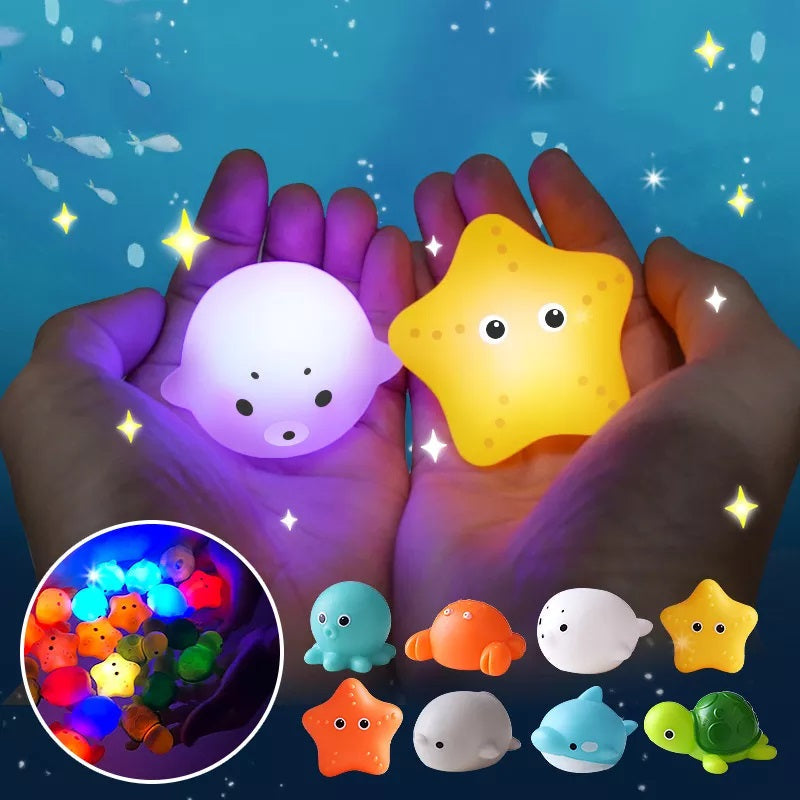 Kids' Twinkling Light-Up Bath Toys Set for fun toddler bath time & sensory play. Water-activated, colorful toys.