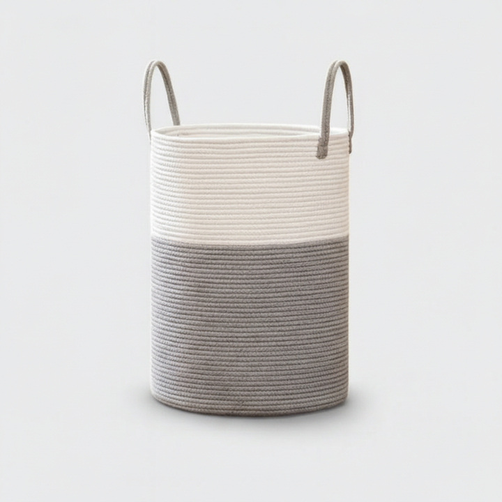 Empty large cotton rope storage basket on a wooden floor, emphasizing its versatile storage potential